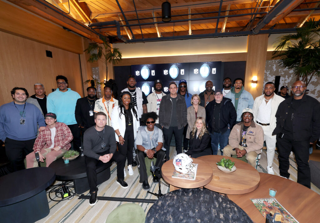 NFL Players, Interscope and NFL Executives pose for a photo at the first-ever music industry session of NFL Career Tours at the Interscope Geffen A&amp;M's headquarters on March 21, 2023 in Santa Monica, California.